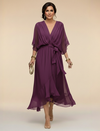 Green Sandra chiffon V-neck dress by THE WHITMORE FAMILY, featuring a flowy design and elegant style in XS size.