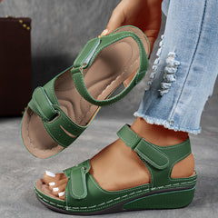 Grey Janet orthopedic comfort flex sandals by THE WHITMORE FAMILY with supportive straps and cushioned soles for all-day wear.