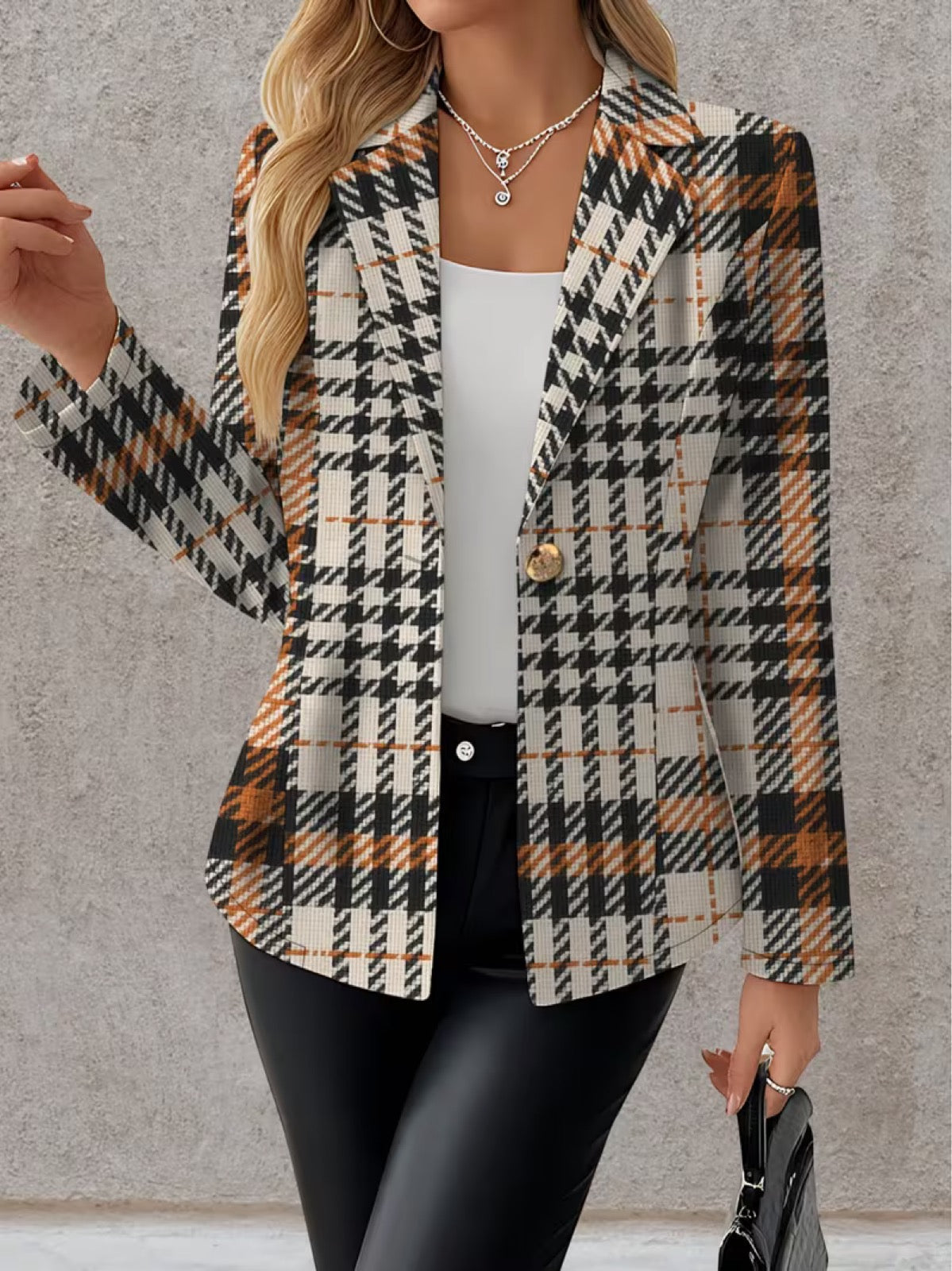 Ghislaine houndstooth blazer by The Whitmore Family, beige and black tailored jacket for women, front view.