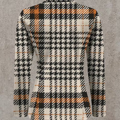 Ghislaine houndstooth blazer by The Whitmore Family, beige and black, tailored jacket with classic pattern, suitable for formal and casual wear.