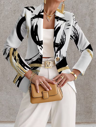 Noemine abstract brushstroke blazer from THE WHITMORE FAMILY, shown in a stylish jacket with a bold brushstroke pattern.