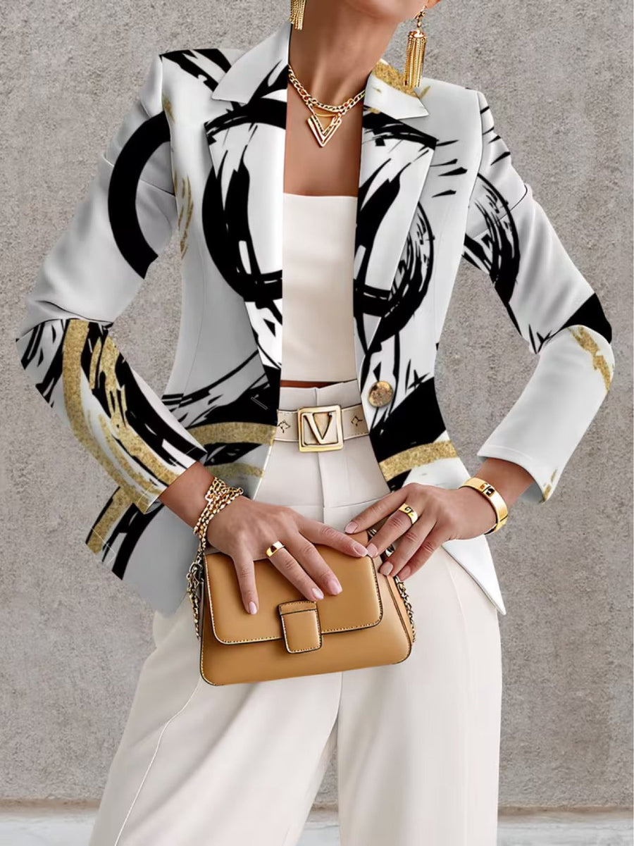 Noemine abstract brushstroke blazer from THE WHITMORE FAMILY, shown in a stylish jacket with a bold brushstroke pattern.