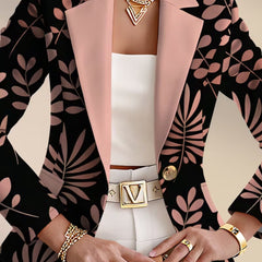 Pink leaf blazer by THE WHITMORE FAMILY, stylish jacket with a pink leaf pattern, shown on a model.