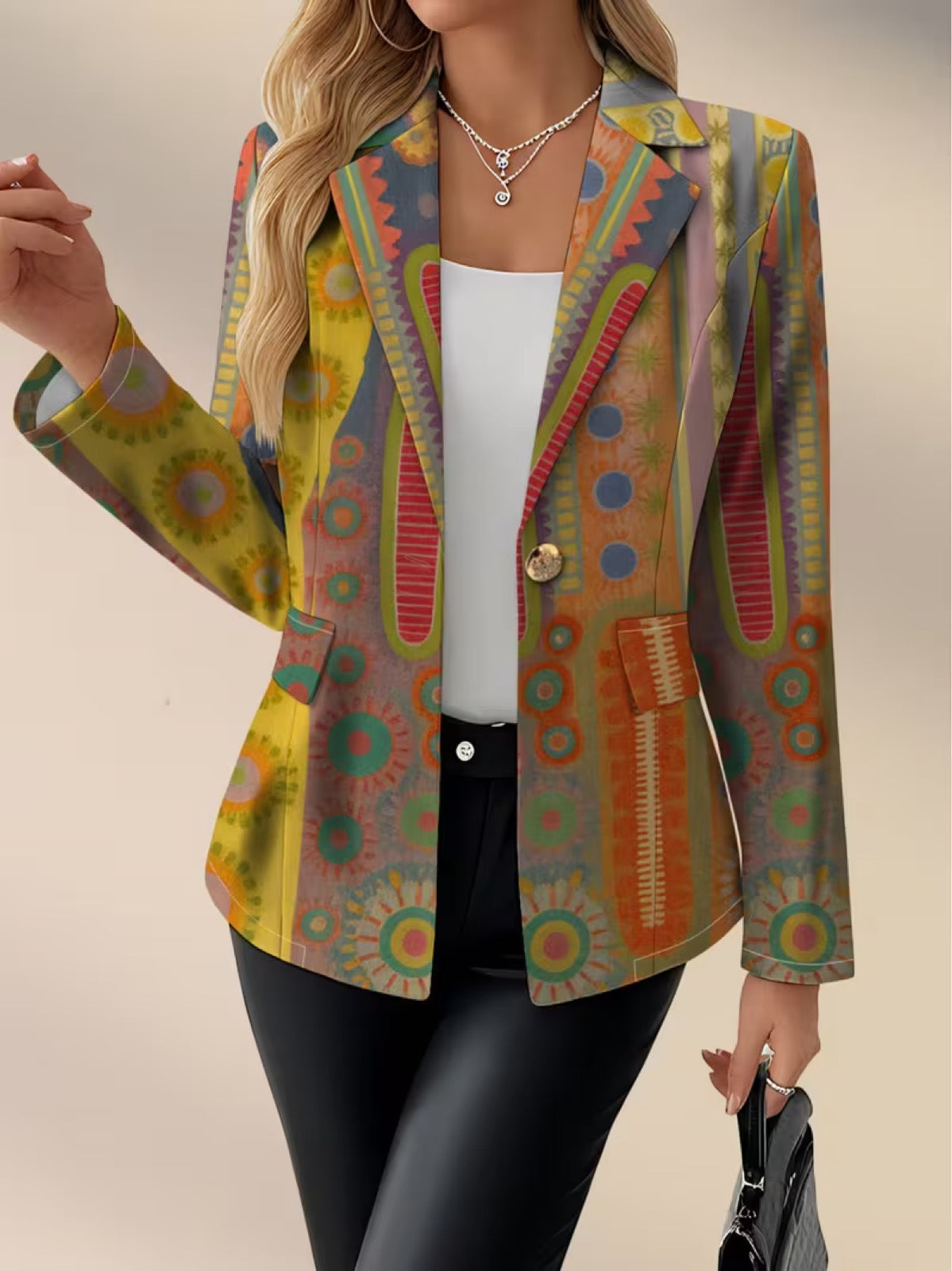 The Whitmore Family Faustine bohemian medallion blazer featuring a stylish patterned design and tailored fit for women.