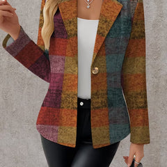 A woman wears the Amandine Autumn Plaid Blazer from The Whitmore Family, featuring classic plaid pattern and tailored fit.