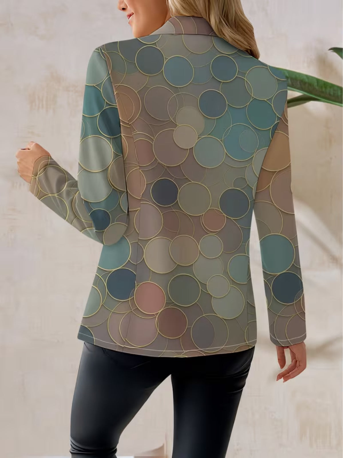 The Whitmore Family Capucine Dot Mosaic Blazer showcasing a stylish, patterned jacket with a tailored fit and vibrant mosaic design.