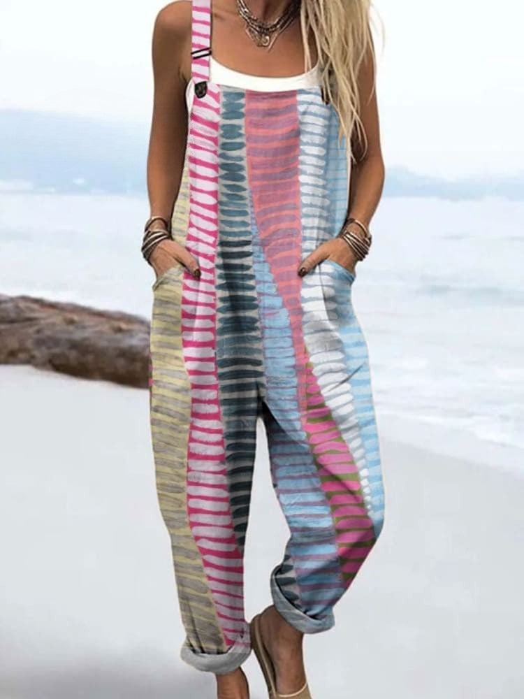 Coastal Rhythm jumpsuit from THE WHITMORE FAMILY Jumpsuit Collection, featuring a stylish, lightweight design in coastal-inspired fabric.