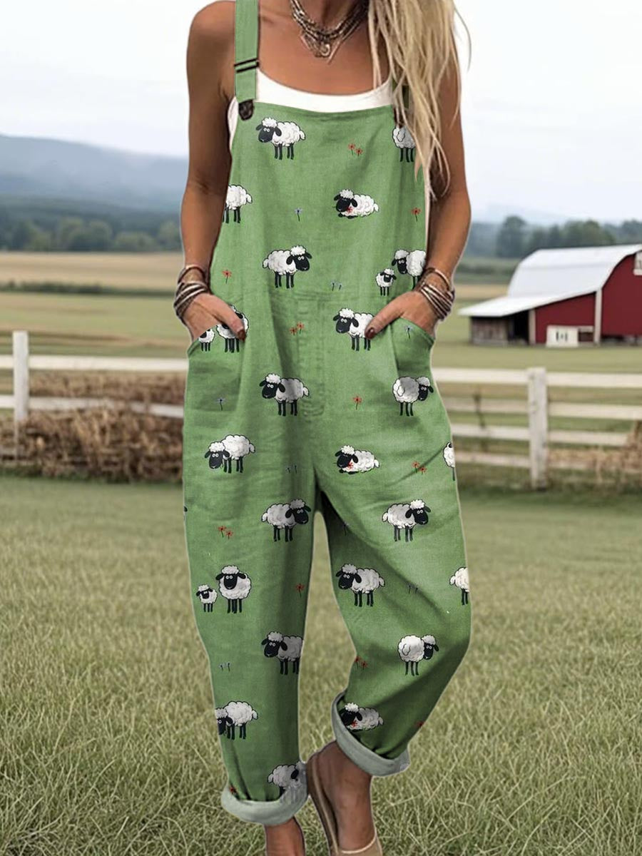 Whimsical sheep jumpsuit from THE WHITMORE FAMILY collection, featuring soft fabric and playful sheep pattern for children.