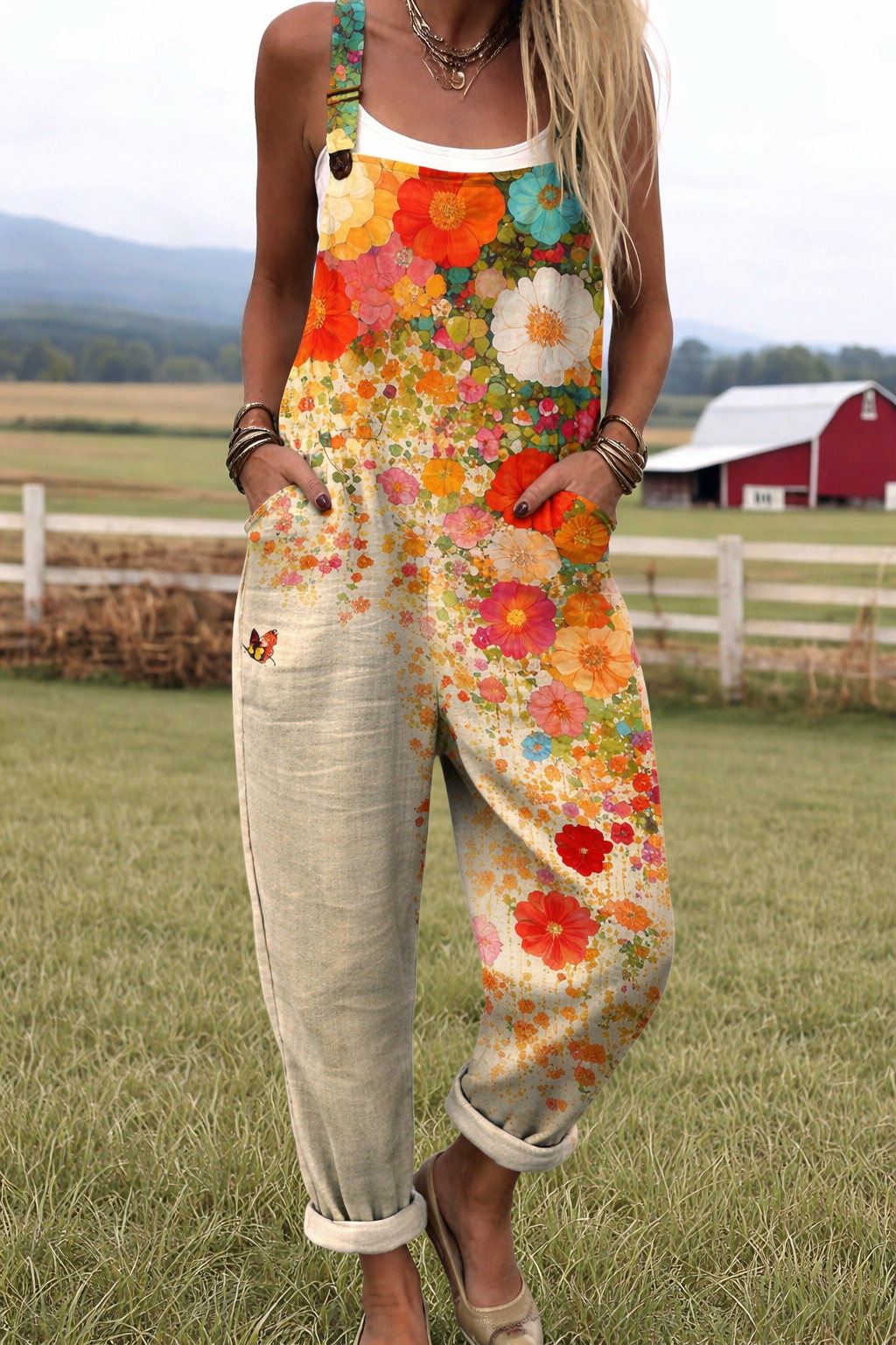 Wildflower Breeze jumpsuit from THE WHITMORE FAMILY jumpsuit collection, featuring a floral pattern and relaxed fit.
