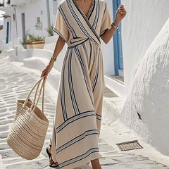 White Lily Santorini summer dress by THE WHITMORE FAMILY, sleeveless linen dress with a flowy design and floral pattern.