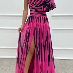 Elegant Shiloh striped maxi dress by The Whitmore Family, perfect for wedding guests, featuring a flowing style and classic pattern.