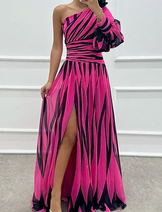 Elegant Shiloh striped maxi dress by The Whitmore Family, perfect for wedding guests, featuring a flowing style and classic pattern.