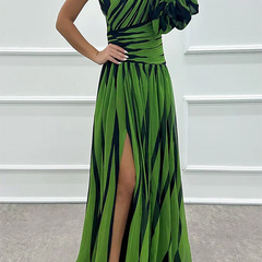 Elegant Shiloh striped maxi dress by THE WHITMORE FAMILY, featuring a flowing design perfect for wedding guest attire.