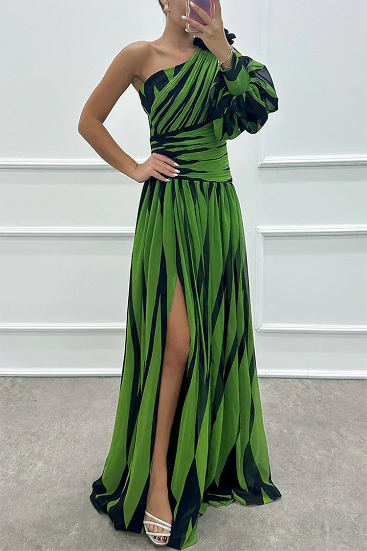 Elegant Shiloh striped maxi dress by THE WHITMORE FAMILY, featuring a flowing design perfect for wedding guest attire.