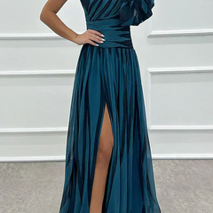 Elegant striped maxi dress by The Whitmore Family, Shiloh style, featuring a flowing design perfect for wedding guest attire.