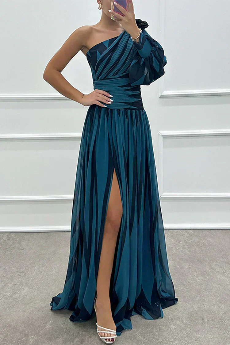 Elegant striped maxi dress by The Whitmore Family, Shiloh style, featuring a flowing design perfect for wedding guest attire.