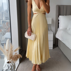 Yellow Madeleine Radiant Twist Dress from THE WHITMORE FAMILY, elegant sleeveless dress with twist detail, perfect for summer occasions.