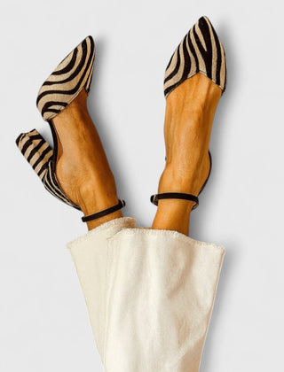 Khaki elegant heels by THE WHITMORE FAMILY, featuring a sleek design and pointed toe for sophisticated style.