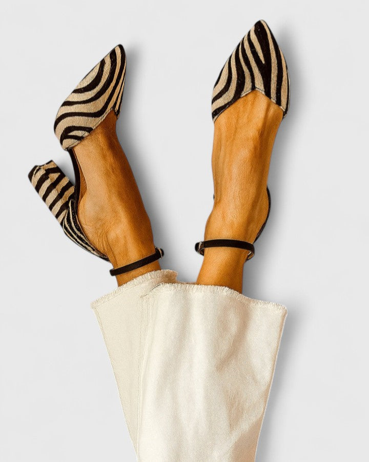 Khaki elegant heels by THE WHITMORE FAMILY, featuring a sleek design and pointed toe for sophisticated style.