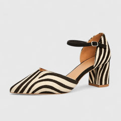 Khaki elegant heels by THE WHITMORE FAMILY, featuring a sleek design and pointed toe for stylish formal wear.