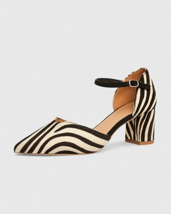 Khaki elegant heels by THE WHITMORE FAMILY, featuring a sleek design and pointed toe for stylish formal wear.