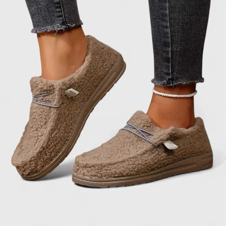 Khaki Nia orthopedic loafers by THE WHITMORE FAMILY, featuring comfortable design and supportive soles for everyday wear.