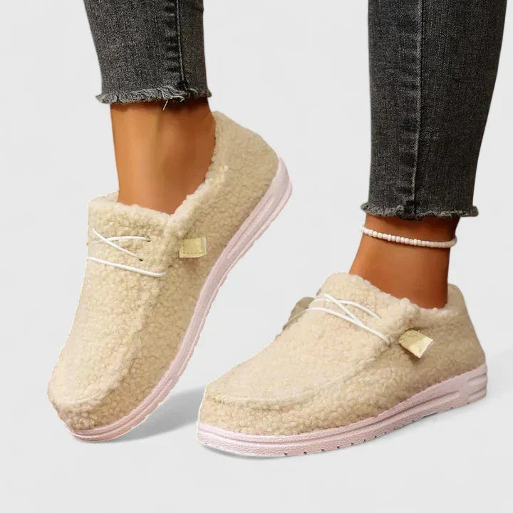 Khaki Nia orthopedic loafers by THE WHITMORE FAMILY, featuring comfortable slip-on design and supportive sole.