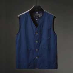Hartley Utility Vest by THE WHITMORE FAMILY, featuring multiple pockets and durable fabric, displayed on a mannequin.