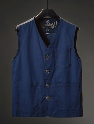 Hartley Utility Vest by THE WHITMORE FAMILY, featuring multiple pockets and durable fabric, displayed on a mannequin.