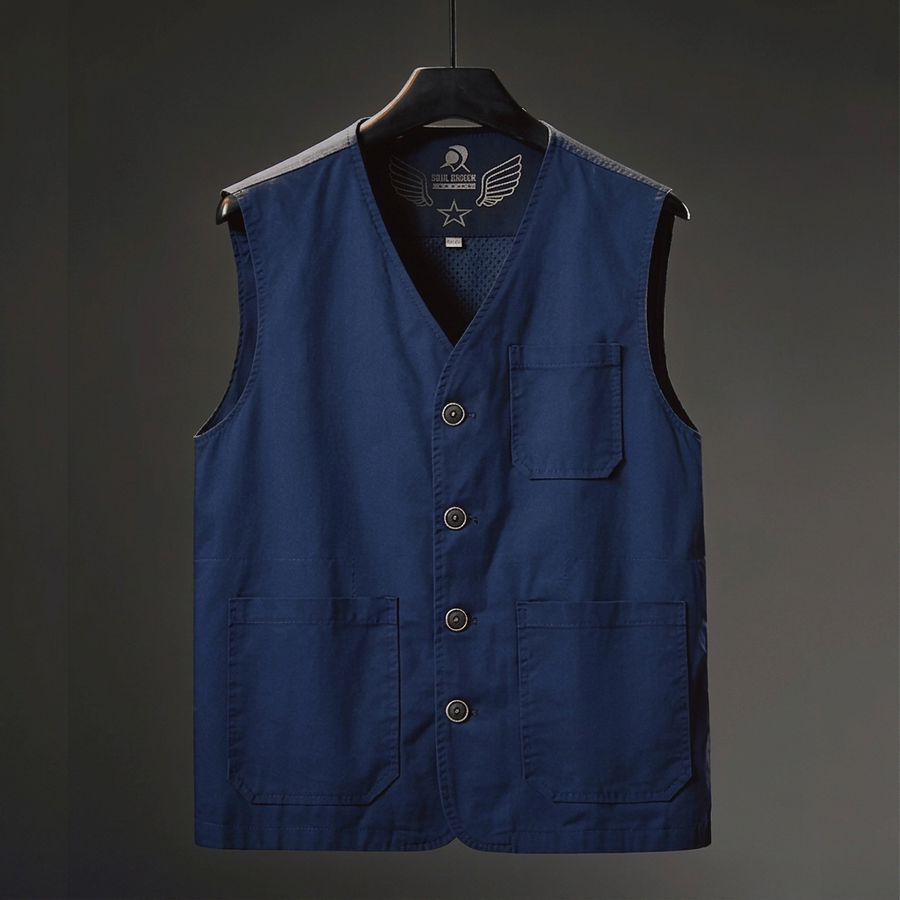 Hartley Utility Vest by THE WHITMORE FAMILY, featuring multiple pockets and durable fabric, displayed on a mannequin.