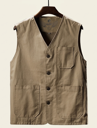 Hartley Utility Vest from THE WHITMORE FAMILY, featuring multiple pockets and durable fabric, shown on a model.