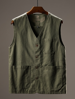 Hartley Utility Vest by THE WHITMORE FAMILY, shown in olive green with multiple pockets and adjustable straps.