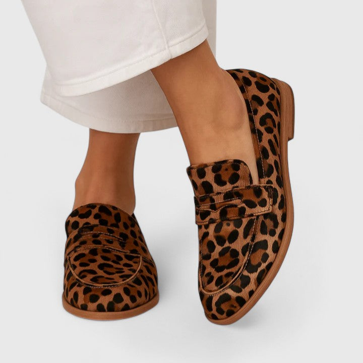 Leopard print Kaevryn ultra-soft loafers by THE WHITMORE FAMILY, featuring a comfortable slip-on design and stylish animal print.