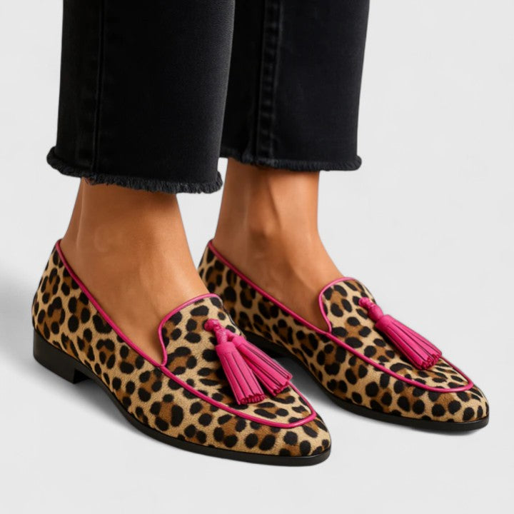 Leopard print Xhyrene stylish support loafers by THE WHITMORE FAMILY, featuring a sleek slip-on design and comfortable fit.