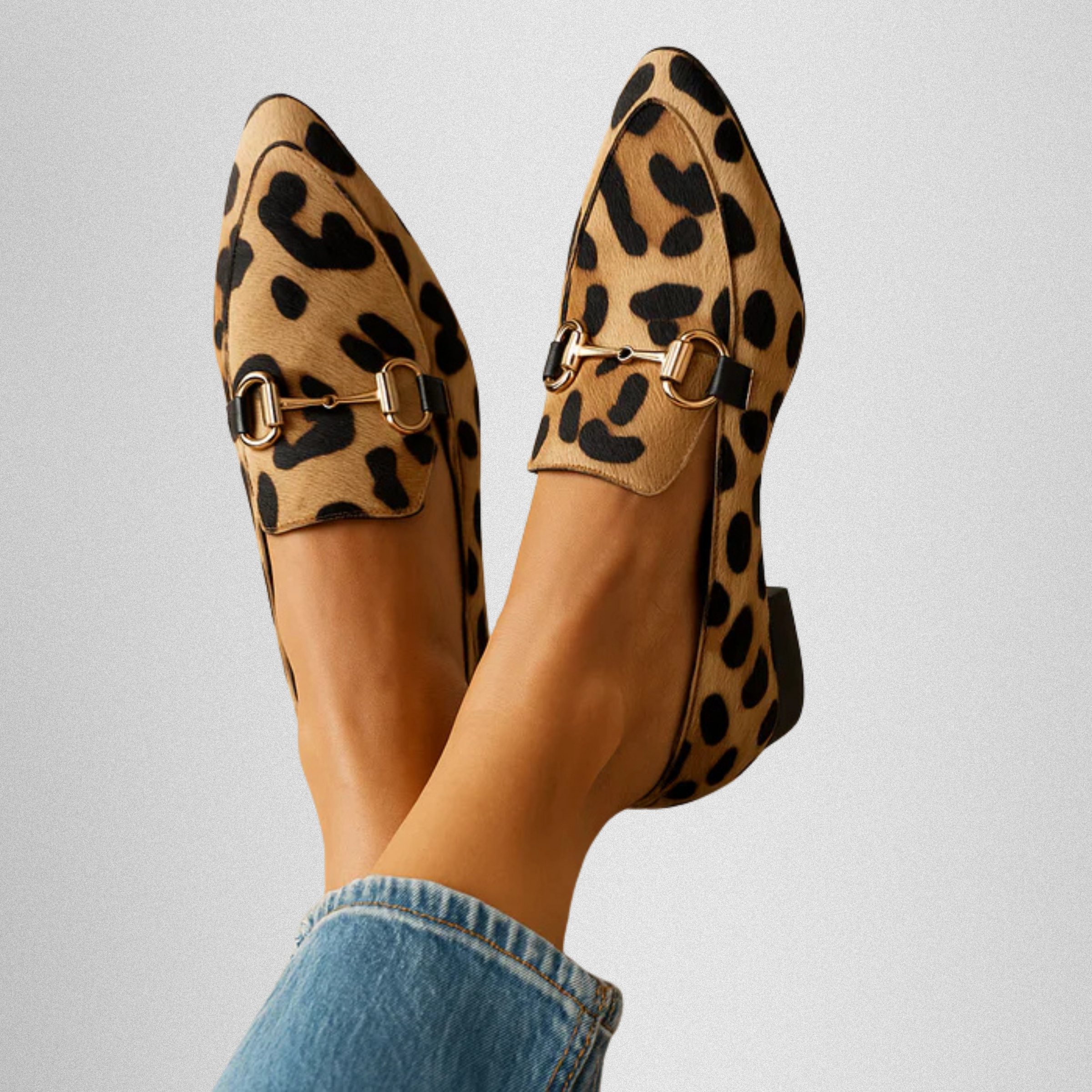 Leopard print Angelique Everyday Elegance Loafers by THE WHITMORE FAMILY, stylish slip-on footwear with a sleek design.