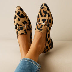 Leopard print Angelique Everyday Elegance Loafers by THE WHITMORE FAMILY, stylish slip-on footwear with a sophisticated design.