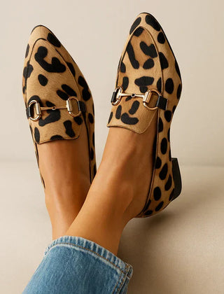 Leopard print Angelique Everyday Elegance Loafers by THE WHITMORE FAMILY, stylish slip-on footwear with a sophisticated design.