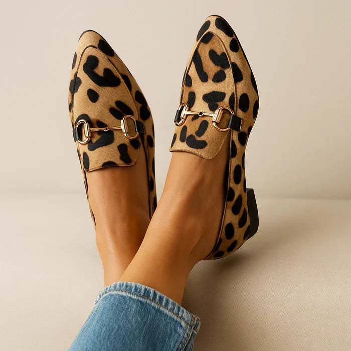 Leopard print Angelique Everyday Elegance Loafers by THE WHITMORE FAMILY, stylish slip-on footwear with a sophisticated design.