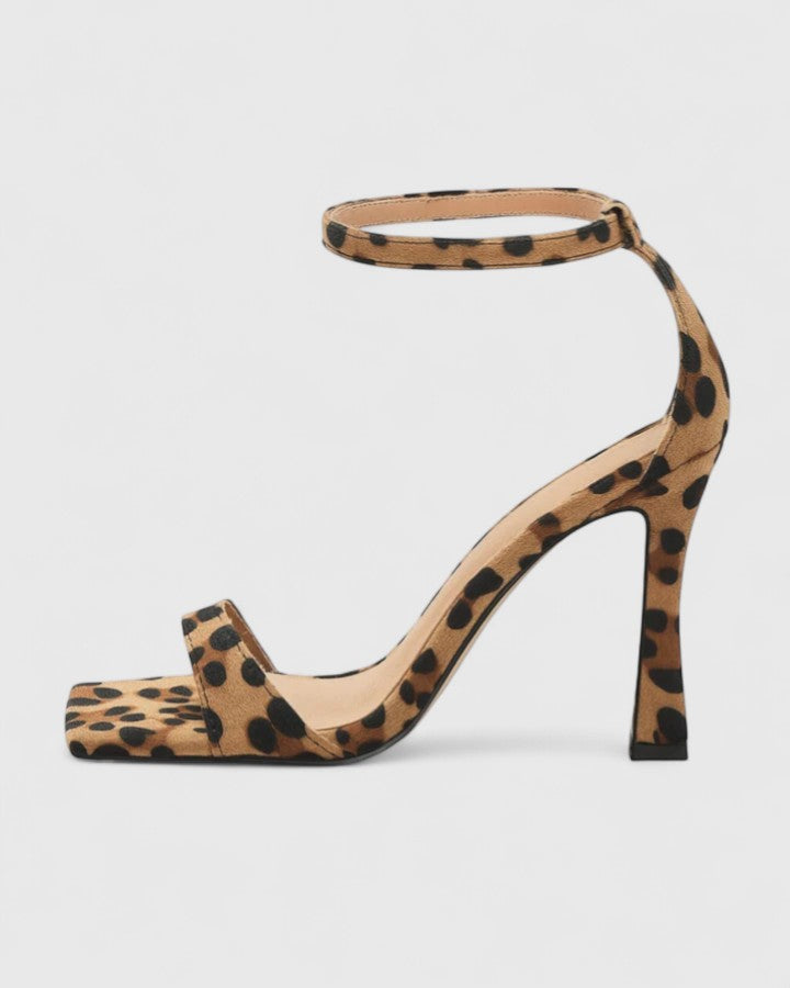 Leopard print Evalisse elegant heels by THE WHITMORE FAMILY featuring pointed toes and stiletto heels.