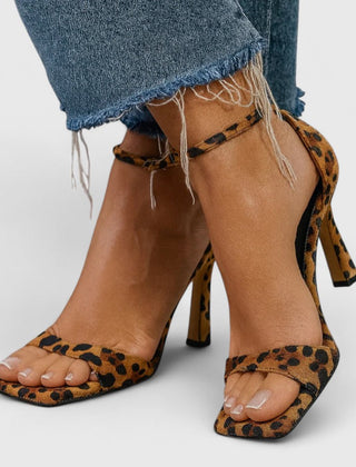 Leopard print Evalisse elegant heels by THE WHITMORE FAMILY featuring pointed toes and slim stiletto heels.