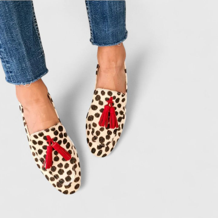 Skylar orthopedic loafers by THE WHITMORE FAMILY featuring leopard print, slip-on style, and cushioned design for comfort.