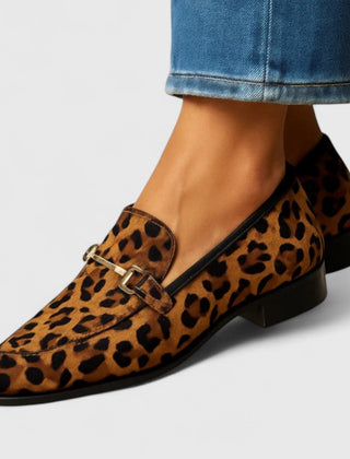 Leopard print Rheavee Soft Step Loafers by THE WHITMORE FAMILY, stylish slip-on footwear with a comfortable design.