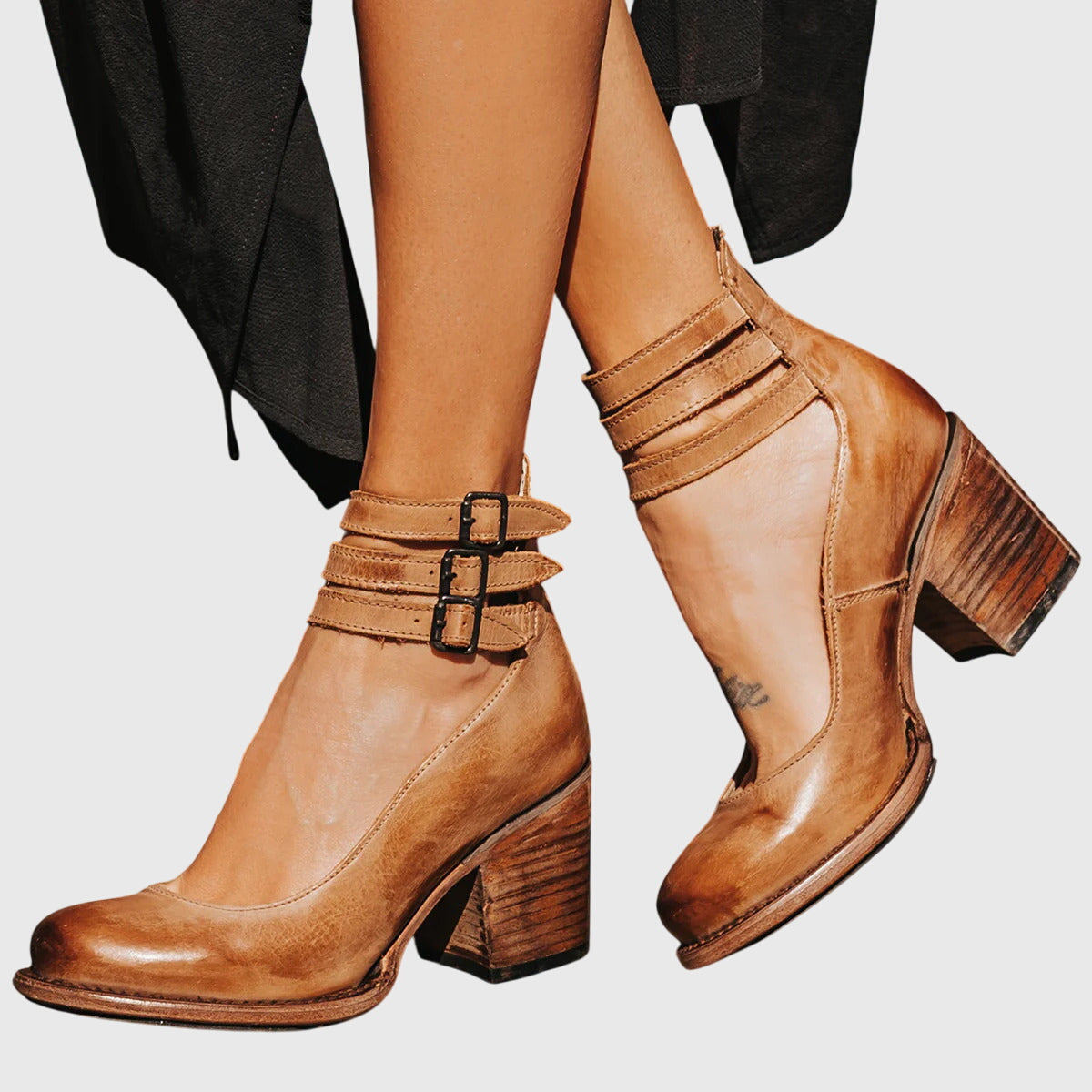 Light brown Nina sandals by THE WHITMORE FAMILY, elegant and comfortable women's footwear with stylish straps and cushioned soles.