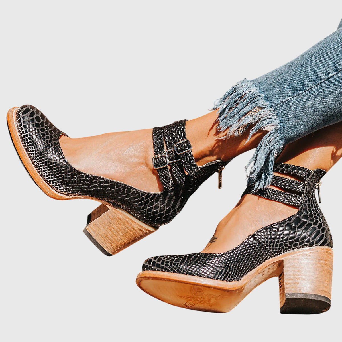Light brown Nina elegant and comfortable sandals by THE WHITMORE FAMILY, featuring stylish straps and cushioned footbed.