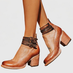 Light brown Nina sandals by THE WHITMORE FAMILY featuring elegant design and comfortable fit for casual or dressy wear.