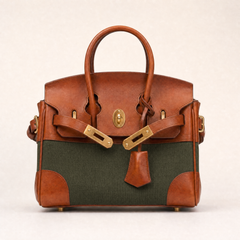 Delphine Top Handle Bag in army green by THE WHITMORE FAMILY, front view showing structured leather design and top handle strap.