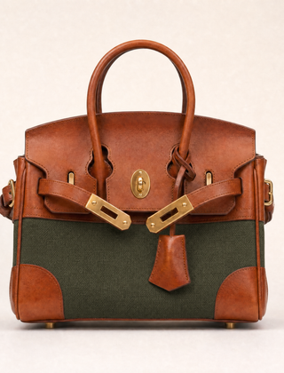 Delphine Top Handle Bag in army green by THE WHITMORE FAMILY, front view showing structured leather design and top handle strap.
