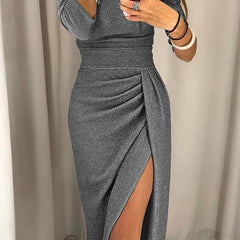 Green Audrey long dress by THE WHITMORE FAMILY featuring modern elegance and flowing fabric, perfect for stylish occasions.