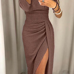 Green Audrey long dress from THE WHITMORE FAMILY, showcasing elegant design and flowing fabric for modern formal wear.