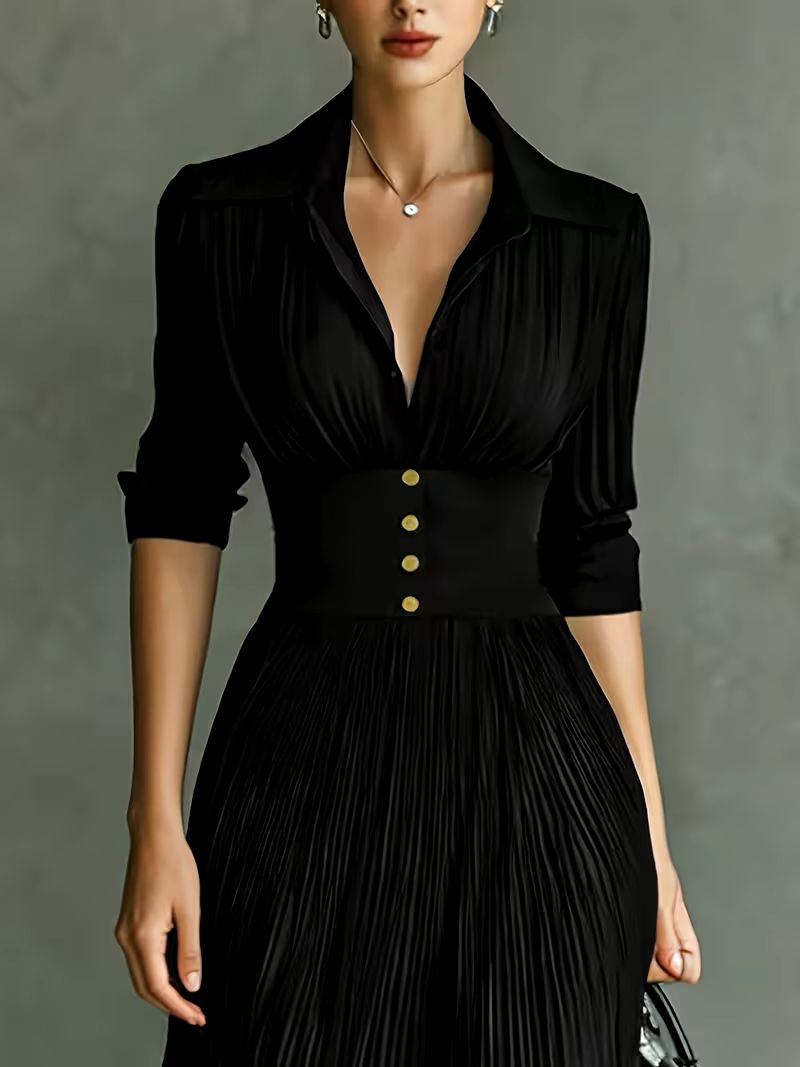 Black Joan maxi dress by THE WHITMORE FAMILY, elegant long dress with a flowing silhouette and stylish design.